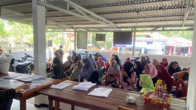 PemDes Puding Salurkan Bantuan Pangan kepada 184 KPM, Warga Terima Beras dan Minyak Goreng